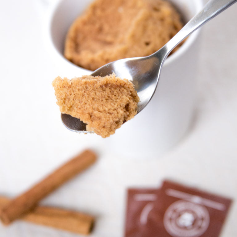 Cinnamon Packets used to top a slice of cinnamon cake